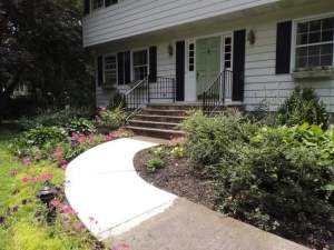 The front walk of this Wallkill home was repaired. Options for painting the walk are explored in this week's Claudia's Corner column